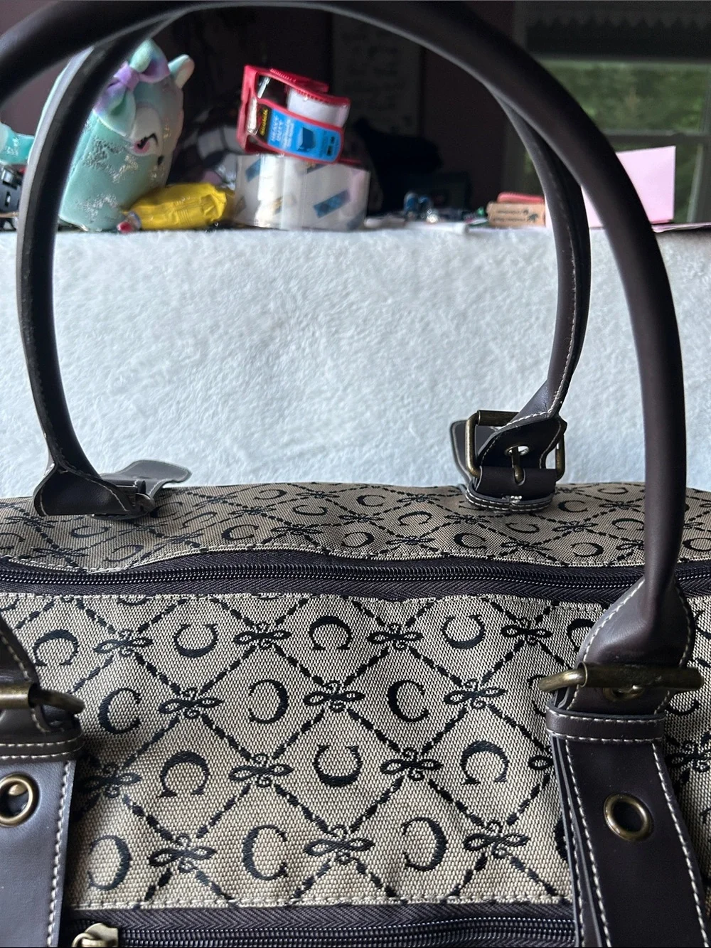 CIAO! 22” duffle bag with faux leather handles buckle